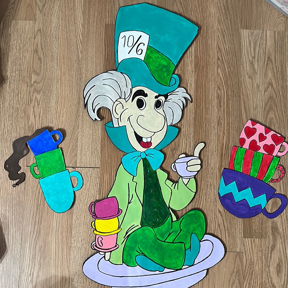 Alice in onederland- mad hatter character and tea cups